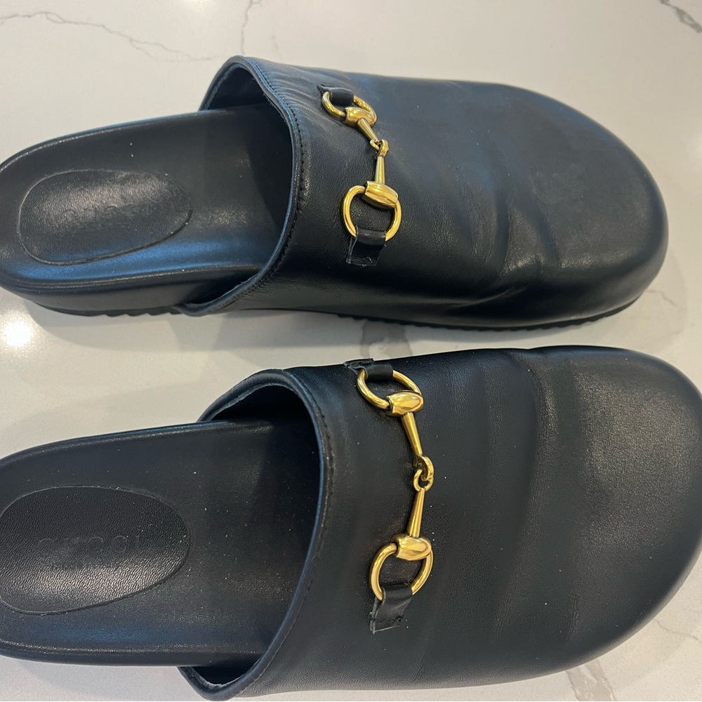 Gucci Black Leather Soles with Gold Detail